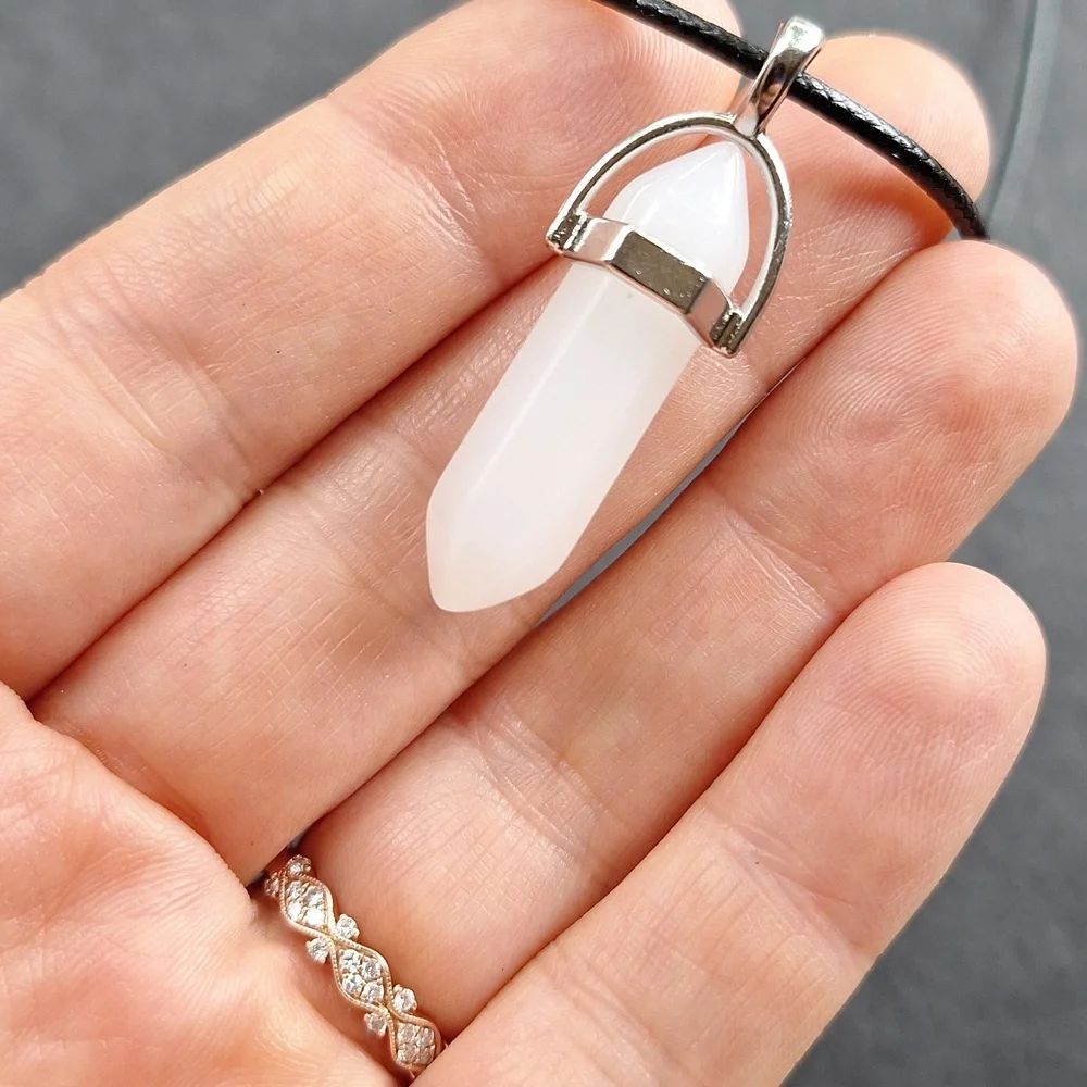White crystal point pendant necklace on 16-inch faux leather chain